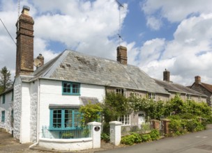 Attractive historic cottages in village of Avebury, Wiltshire, England, UK