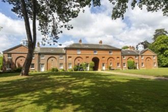 Stable block buildings converted to residential use, Sudbourne Hall, Suffolk, England, UK