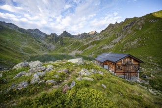 Cabane du Louvie mountain hut and Lac du Louvie mountain lake, Valais Alps, Val de Bagnes, Valais,