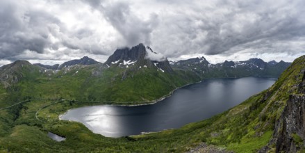 View of Mefjorden fjord from Barden mountain, Breidtind mountain peak behind, Senja, Norway, Europe