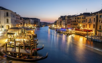 View of the Grand Canal at the blue hour, picturesque evening mood with illuminated palazzos on the