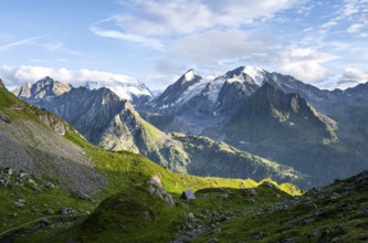 View from the Cabane du Louvie to the glaciated mountain peaks of the Grand Combine, in the evening
