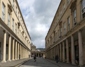 Georgian style buildings with colonnades, Bath Street, city of Bath, north east Somerset, England,