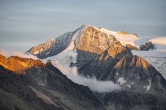 Mountain peak Mont Blanc de Cheilon with glaciers, alpenglow at sunset, Hérménence, Valais Alps,