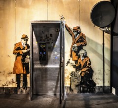Banksy - Spy Booth, reference to state surveillance, 2014, Cheltenham, UK, exhibition The World of