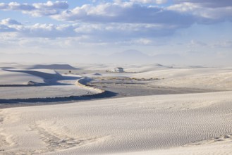 Cleared roads through the white gypsum dunes at White Sands National Park in Alamogordo, New