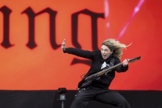 Daniela Villarreal Vélez, singer of The Warning is surprised by a gust of wind at the Rock am Ring