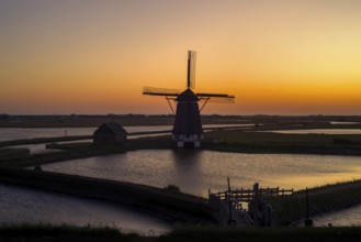 1878 windmill Het Noorden, traditional polder mill, smock mill near Oosterend on the island Texel