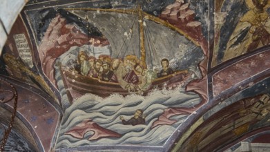 Medieval fresco of a boat with saints on a stormy sea, Apostle John sailing from Ephesus to Patmos,