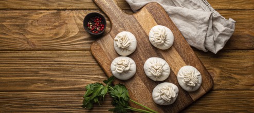 Raw freshly made Khinkali, traditional dish of Georgian Caucasian cuisine, dumplings filled with