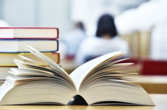 Books lying on the table in the public library
