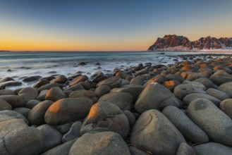 The famous beach near Uttakleiv with round shaped rock boulders on the Lofoten islands in Norway on