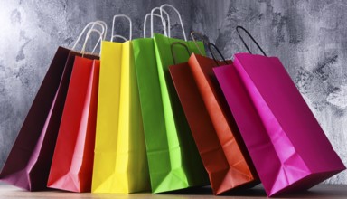 Composition with colorful paper shopping bags