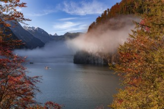 Morning fog in autumn over the Königssee in Berchtesgadener Land, Bavaria, Germany. Fog over the