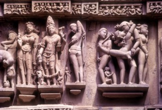 Erotic sculptures on South Facade, Lakshmana temple in Khajuraho, Madhya Pradesh, India, Asia.