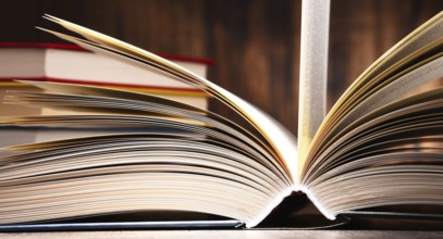 Composition with open book on the table