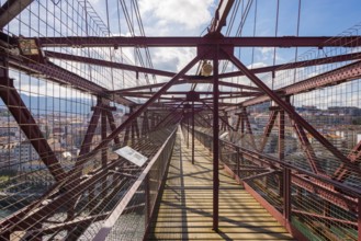 View along the gangway of the bridge. The Vizcaya Bridge, the worlds oldest transporter bridge,