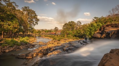 Long exposure of majestic Tad Lo waterfalls in Salavan province in southern Laos