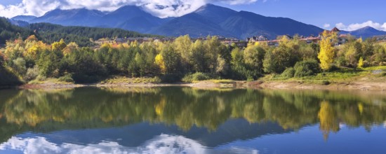 Bansko, Bulgaria autumn banner panorama background of Pirin mountain peaks, Krinets lake water,