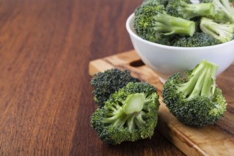 fresh broccoli on a wooden table