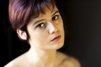 Fashion portrait of a 23 year old white woman with short, dyed hair, Brussels, Belgium, Europe
