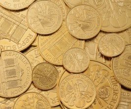 Investing in real gold as gold bars and gold coins