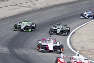 NTT INDYCAR SERIES driver, ROMAIN GROSJEAN (77) of Geneva, Switzerland races through the turns