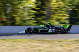 INDYCAR Series driver, CALLUM ILOTT (77) of Cambridge, Cambridgeshire, England, travels through the