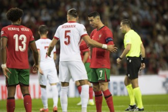 Football match, captain Cristiano RONALDO CR7 Portugal r. with captain's armband is watched from