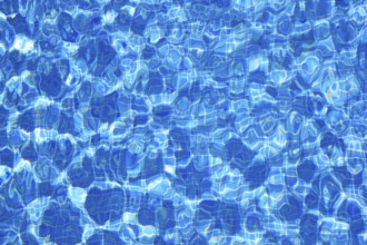 Blue tiles pool water ripple texture background