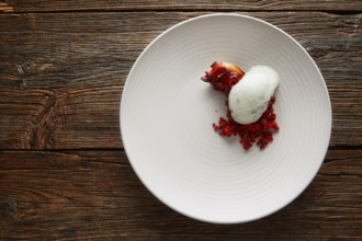 Grilled octopus with parsley air foam served with crunchy chorizo sausage