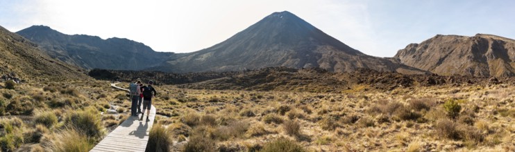 Hiking the Tongariro Alpine Crossing through Mangatepopo valley, Mt Ngauruhoe in the background,