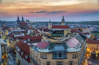 Rooftop view of Prague at colorful sunset