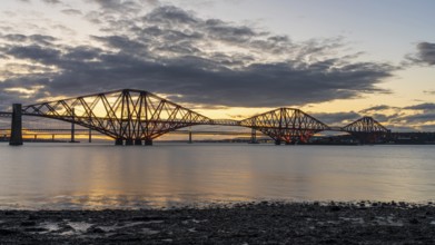 Evening atmosphere at the Forth Bridge, seen from South Queensferry, City of Edinburgh, Scotland,