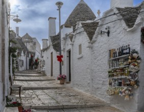 Alberobello, Italy, 2 December, 2023: souvenir shop woth local specialities in the Rione Monti