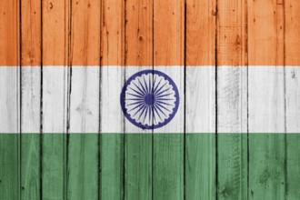 The Indian flag painted on a wooden fence