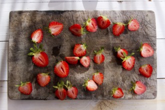 Small pieces of strawberries for the preparation of salad