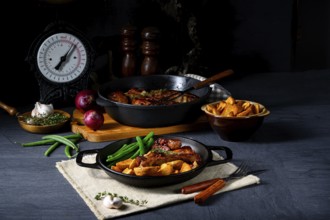 Pork with beans and quarter potatoes