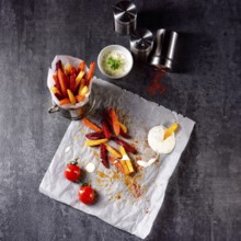 Vegetable French fries with herb quark and tomatoes