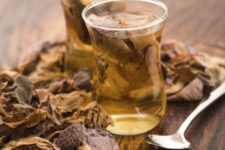 Lotus petals tea on wooden background