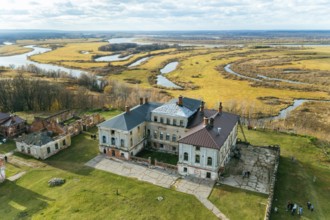 Manor house of Priklonsky Rukavishnikovs on Oka river. Aerial drone view of historical residence of