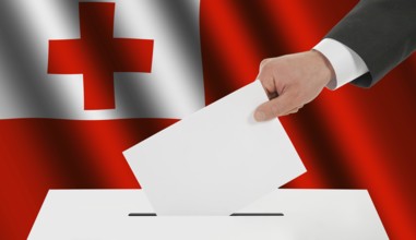 The Tonga flag and the hand with the bulletin about the ballot box
