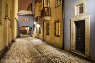 Dawna street on winter night in Old Town of Warsaw city in Poland