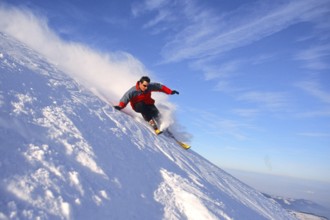 Skiers in action, Alps, Austria, Europe