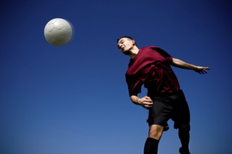 Soccer or football player in action