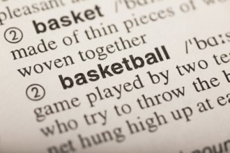 Basketball, word in dictionary. macro shot. selective focus