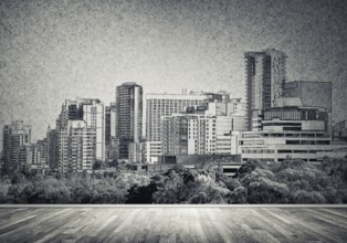 Silhouette of modern city landscape drawn on concrete wall