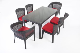 Suite of wicker furniture made of synthetic fibre on isolated background