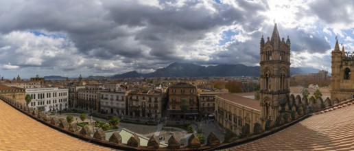 A panorama view over the rooftops of downtown Palermo with the cathedral bell tower in the