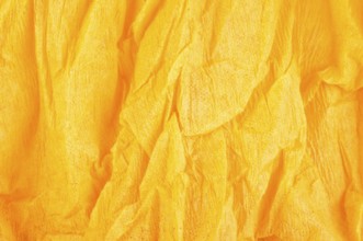 Background of orange old crumpled paper